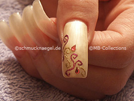 clear nail lacquer, the tweezers and two drop shaped strass stones
