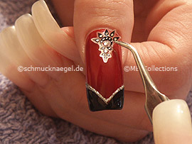 Tweezers and nail sticker