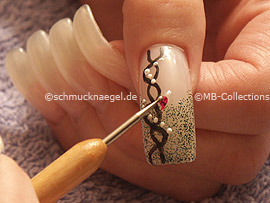 clear nail lacquer, spot-swirl and drop shaped strass stones
