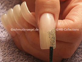 nail lacquer in the colour green-glitter