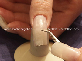 tweezers, cutter and clear adhesive tape