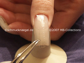 tweezers, cutter and clear adhesive tape