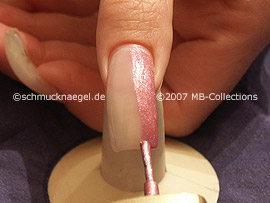 nail lacquer in the colour dark-pink