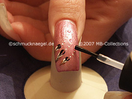 clear nail lacquer, spot-swirl and strass stones