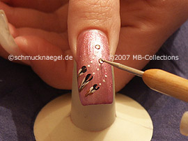 clear nail lacquer, spot-swirl and strass stones