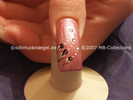 clear nail lacquer, spot-swirl and strass stones
