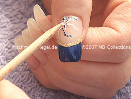 Clear nail polish, rosewood skewer and a strass stone in crystal