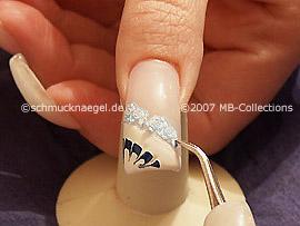 tweezers and nail sticker