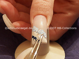 tweezers and nail sticker