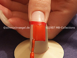 nail lacquer in the colour dark orange