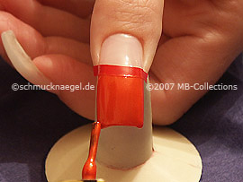 nail lacquer in the colour dark orange