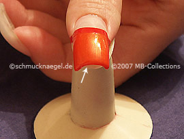 nail lacquer in the colour dark orange