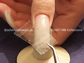 tweezers and clear adhesive tape