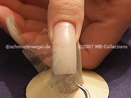 tweezers and clear adhesive tape