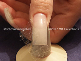 tweezers and clear adhesive tape