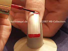 nail lacquer in the colour dark red