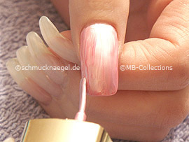 Nail polish in the colour pink