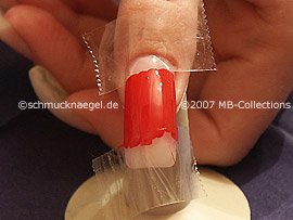 Nail art lacquer in the colour red