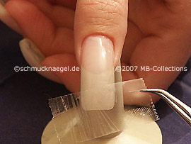 Clear adhesive tape and tweezers
