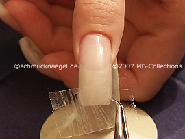 Clear adhesive tape and tweezers