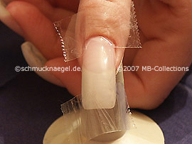 Clear adhesive tape and tweezers
