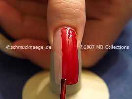 Nail lacquer in the colour red